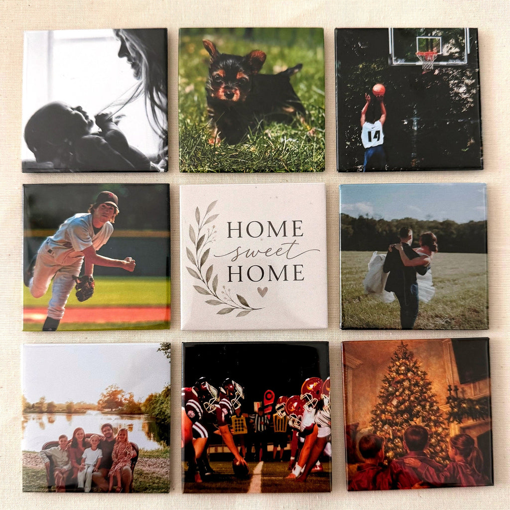 Nine photo magnets arranged in a grid on linen