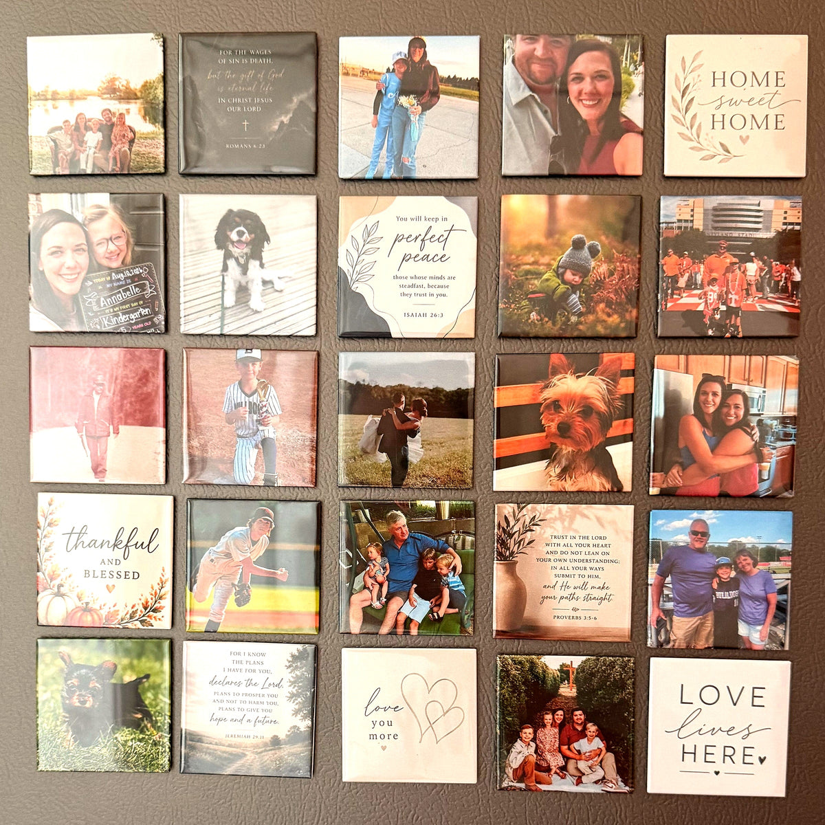 Twenty-five photo magnets laid out in a five by five grid, showing the range of photographs one order can hold.