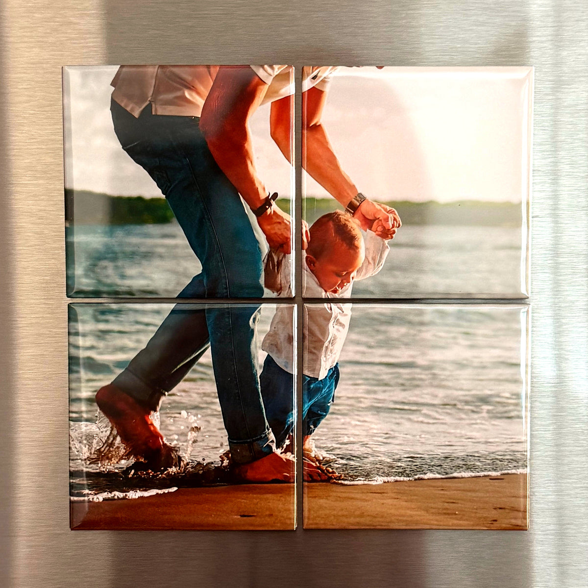 One photograph split across four magnets on a fridge door.